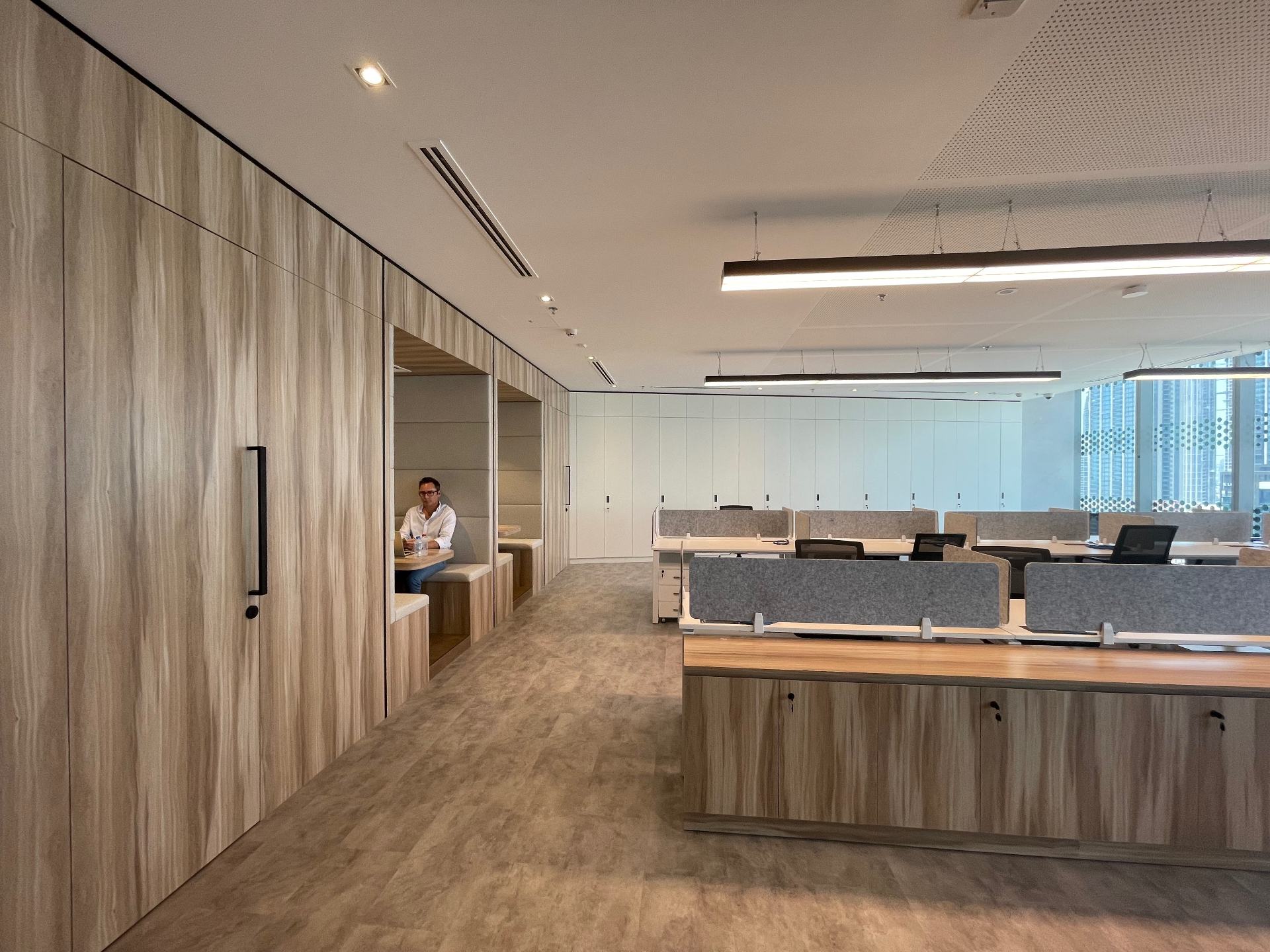 Focus booths, storage wall & benching desks — corporate office delivered from design to execution by Ab & Zen Interior