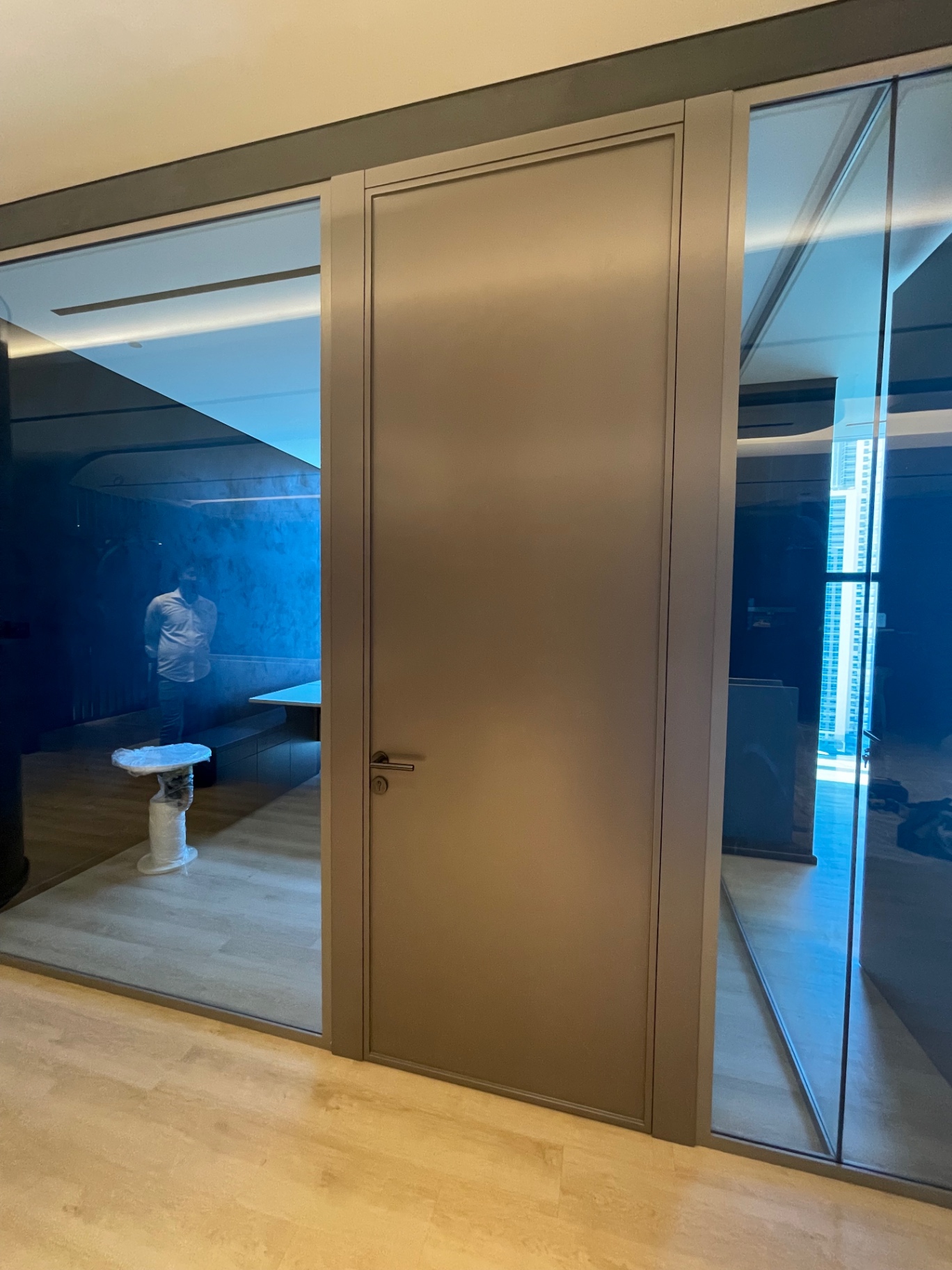 Bronze-framed doors & tinted glazing — complete fit-out execution and handover by Ab & Zen Interior